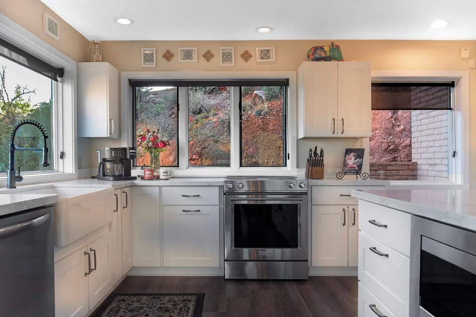 A chef’s delight! This fully modernized, spacious kitchen offers plenty of room for the whole family to cook and create together.