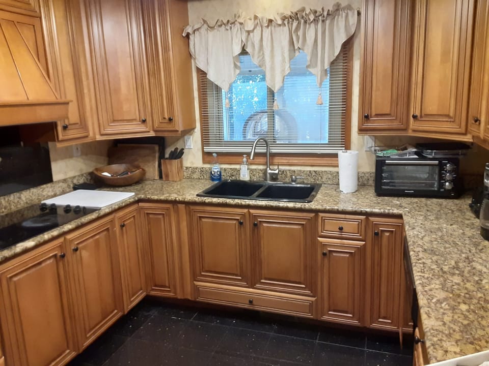 kitchen area has garbage disposal and dishwasher 