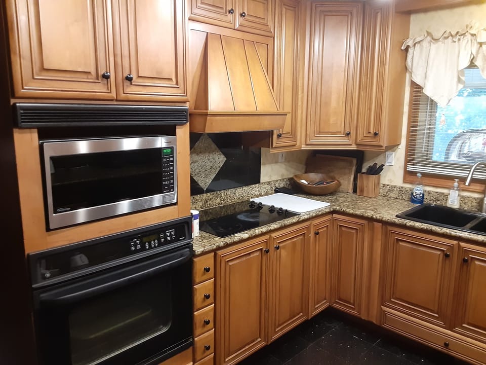 kitchen stove. frig has ice maker