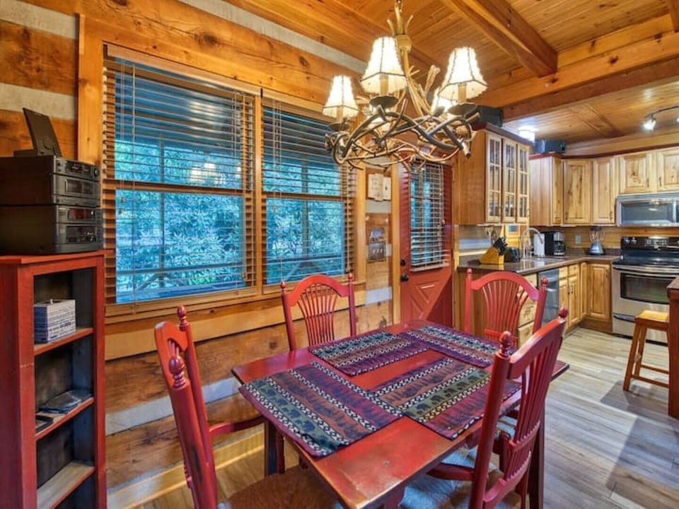 Dining area overlooking the kitchen, enjoy watching the chefs prepare the feast!