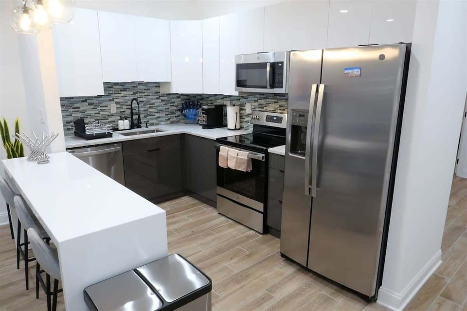 Kitchen includes BRAND new appliances and cabinets, and essentials for cooking 