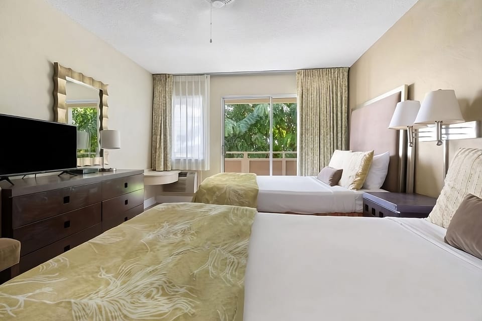 Wake up to lush views from crisp, comfortable twin beds.