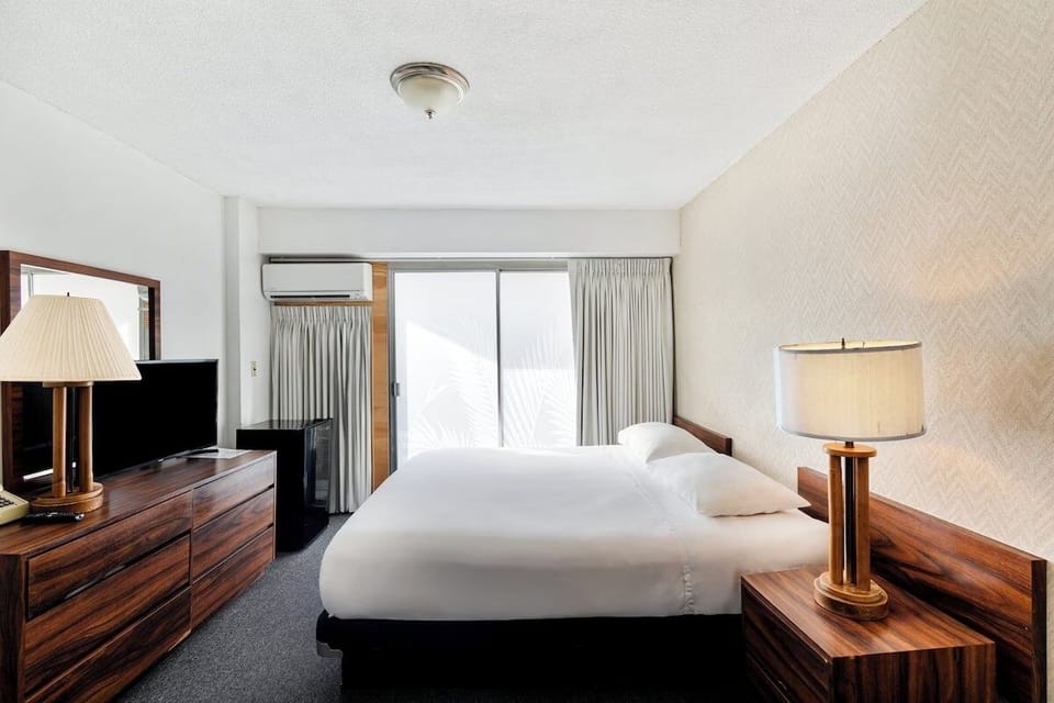 Unwind in a bright, airy room with calming natural light.