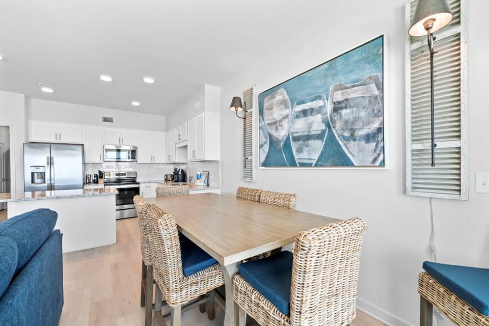 Your bright dining area flows seamlessly into the modern kitchen, creating the perfect space for memorable meals together.
