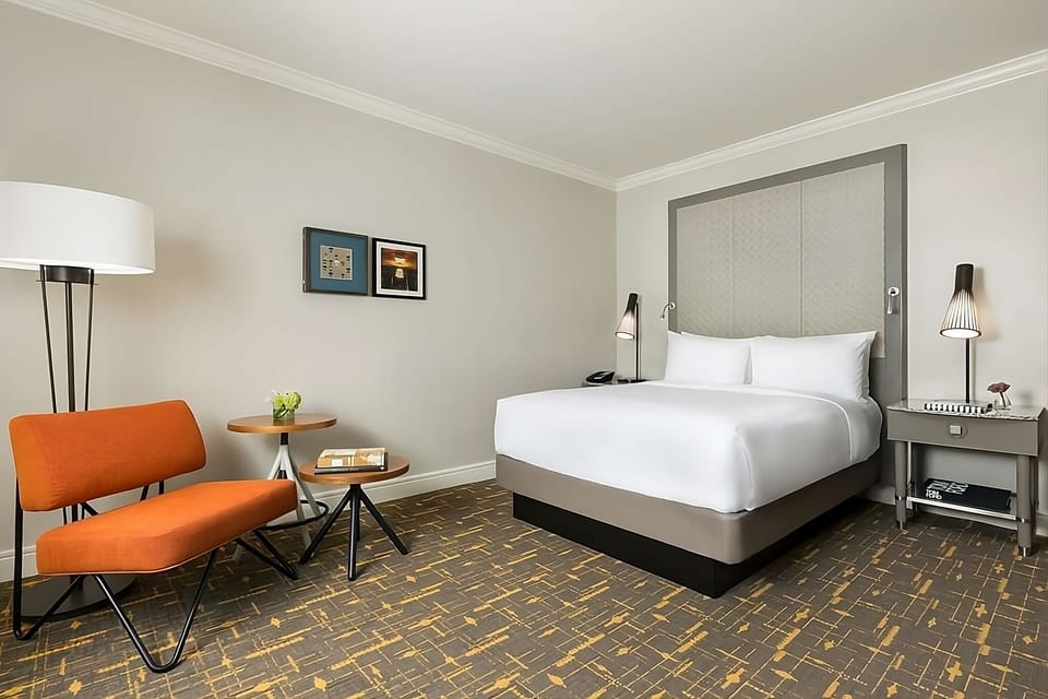 Recharge in a serene room designed for deep, restful sleep.