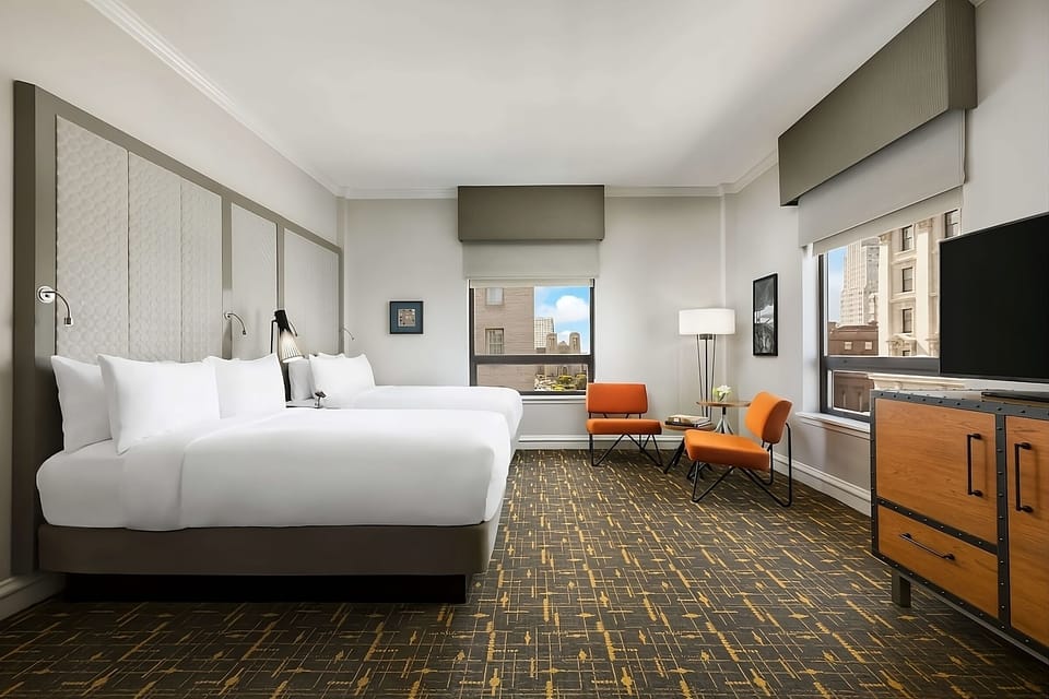 Unwind in a bright, spacious room with comfy beds.