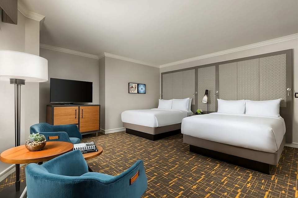 Relax in a spacious room with seating and entertainment.