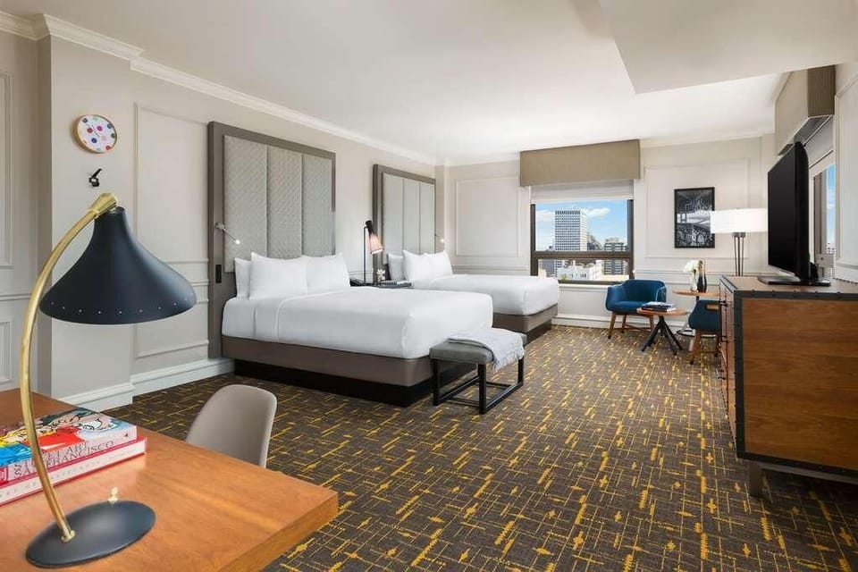 Settle in together with two plush beds and open space.