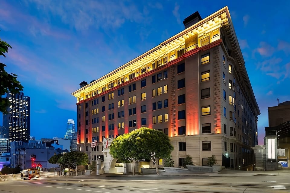 Return to a beautifully lit facade after an evening out.