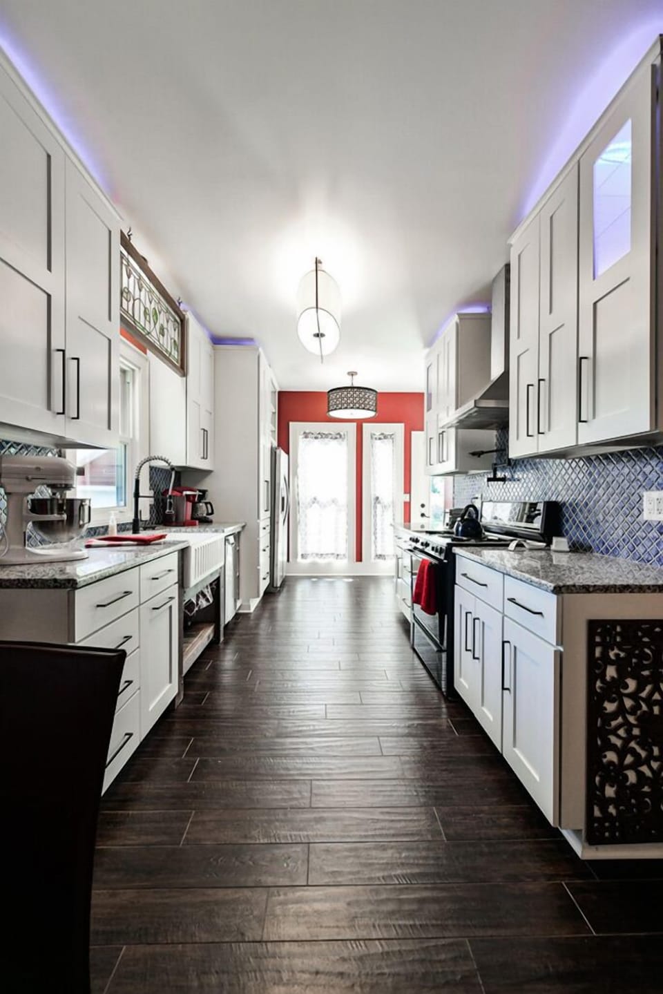 Kitchen is stunning, new cabinetry, tile floor, granite countertops. 