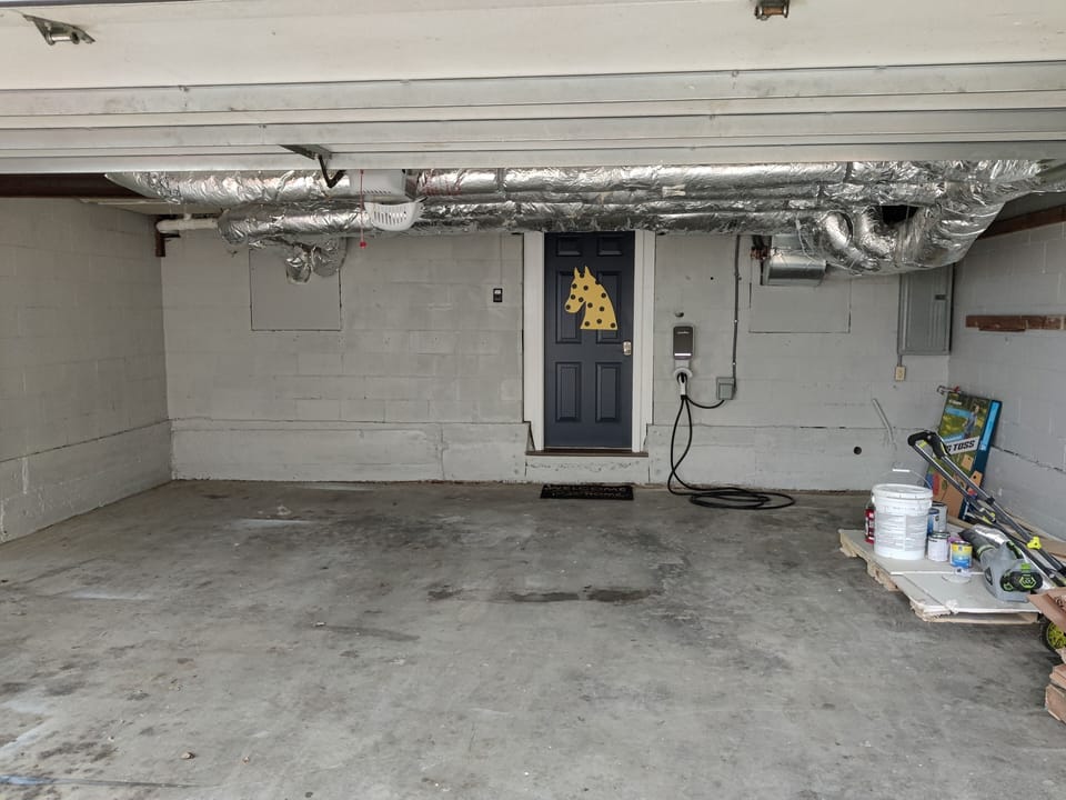 Enjoy a private garage (Max Hight 74in) with EV Charger