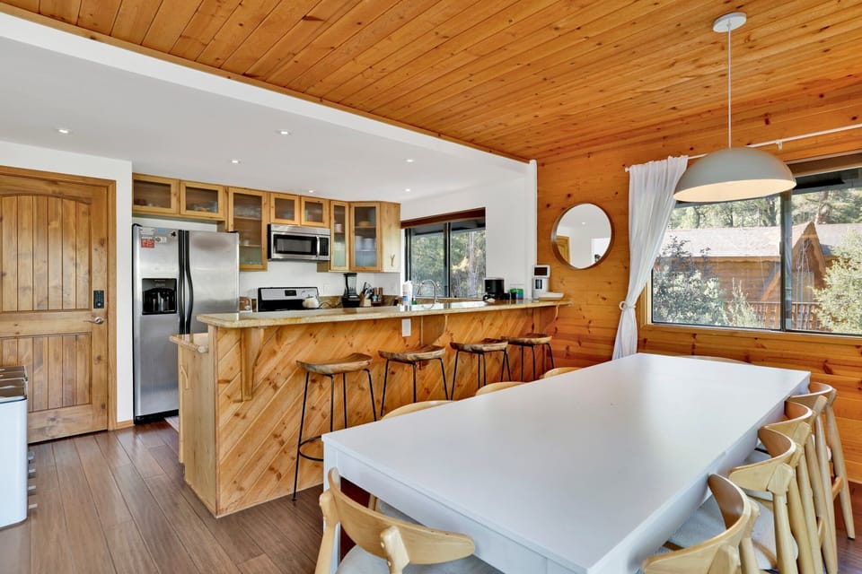 Inviting dining area designed for comfort and connection. The space feels open and airy, with a warm atmosphere that makes everyday meals and special gatherings equally enjoyable.