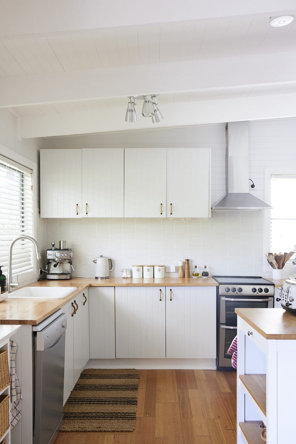 The kitchen is stocked with essentials such as a coffee machine & soda maker
