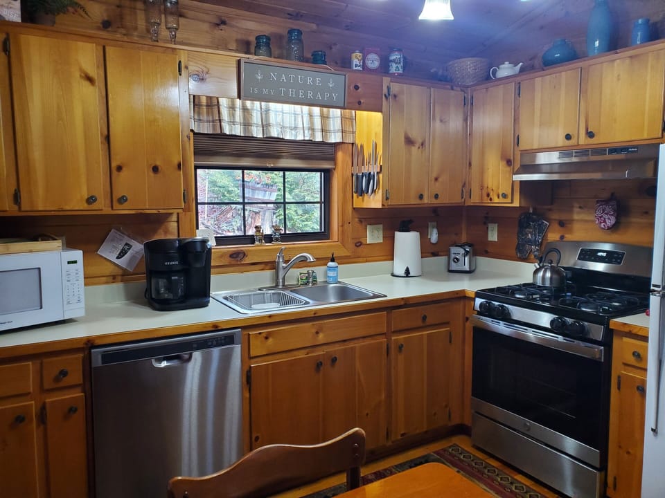 Fully equipped kitchen with New gas range, toaster, and Keurig Duo coffeemaker
