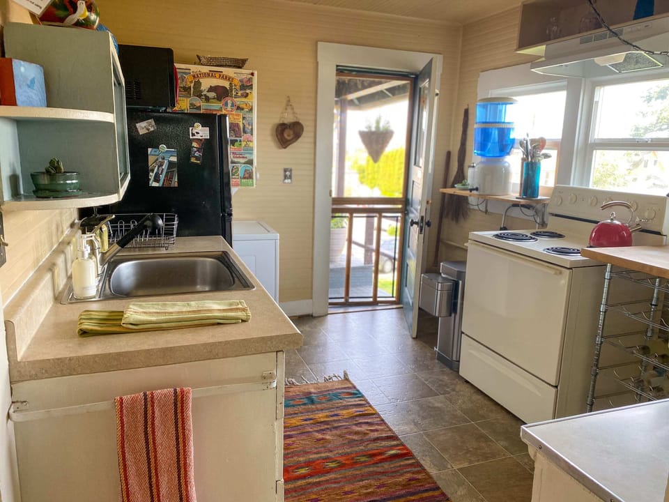 Step into the lively and bright kitchen.