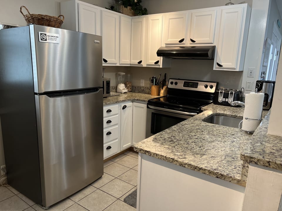 Full kitchen with dishwasher