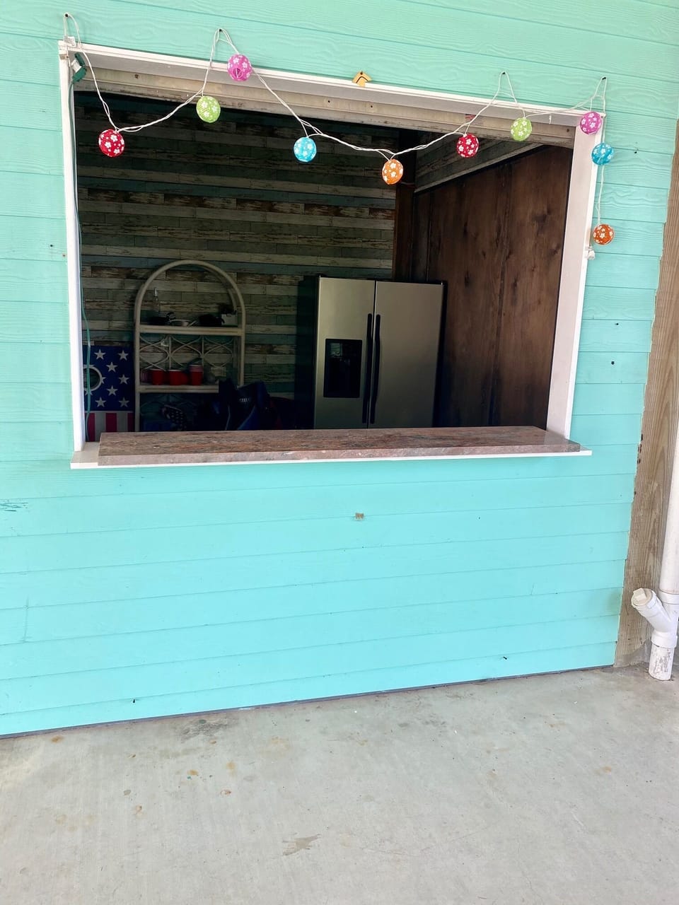 Tiki bar with both electricity for karaoke or other things and a full fridge too