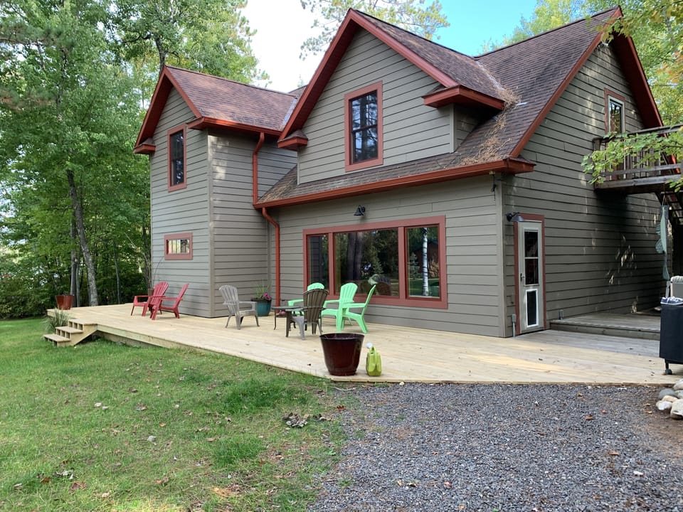 Wrap around deck for relaxing and looking at lake