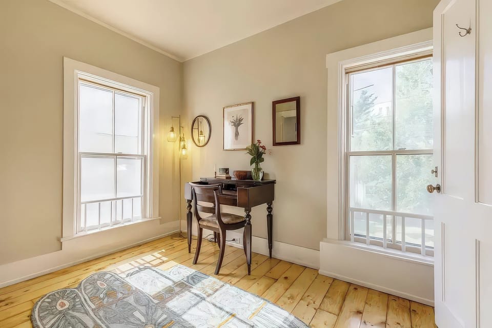 Upstairs office connects to front and middle bedroom.