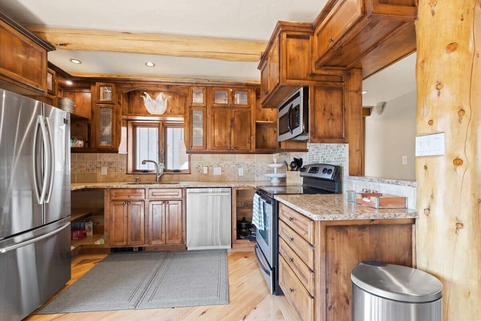 Fully-equipped kitchen with high-quality stainless steel appliances