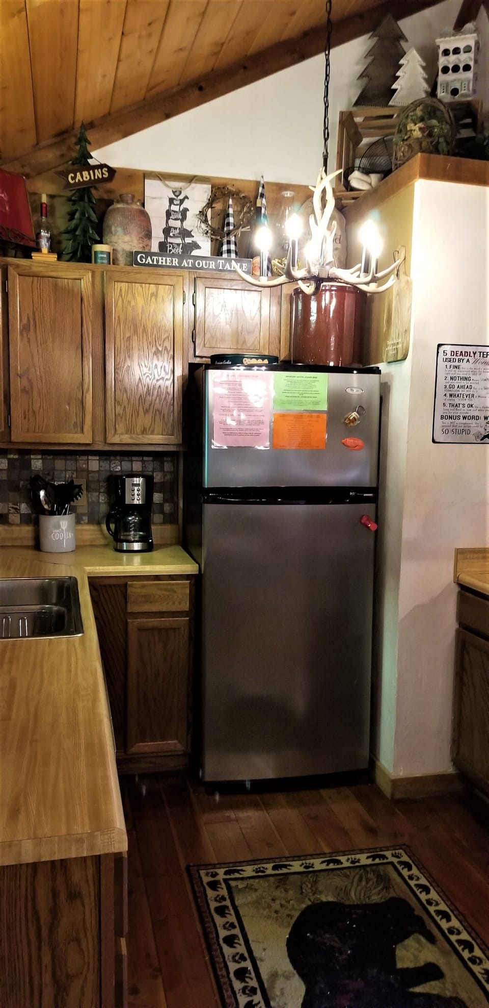 Kitchen has refrigerator w/icemaker, smooth top range, dishwasher & microwave