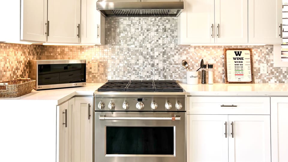 Remodeled in 2019 w/ gorgeous cabinetry, quartzite counters, designer tile, etc.