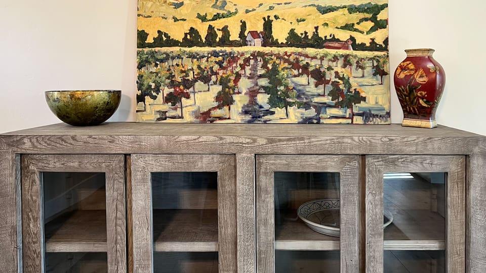 Restoration Hardware furnishings and original art.