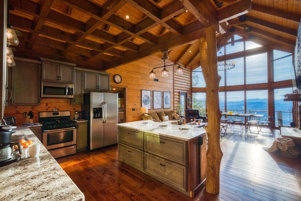 Breathtaking views greet you as soon as you walk into the home, with the open concept kitchen and custom pergola design.  