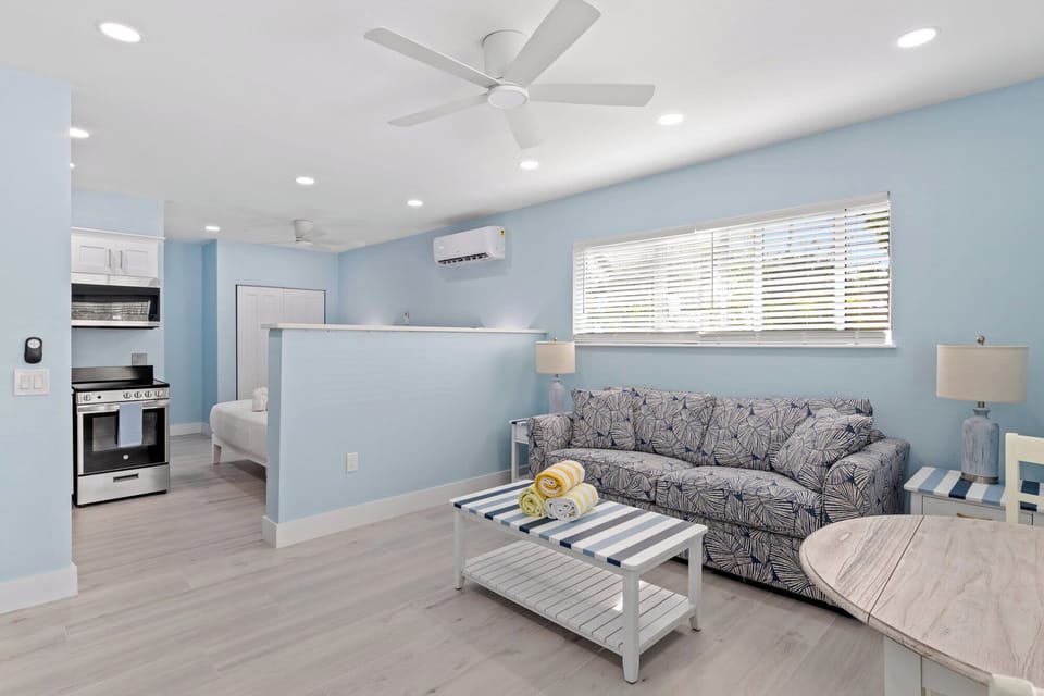 Creole Garden Cottage at The Palmview Inn features a king bed, queen sleeper sofa with memory foam mattress, kitchen, and bathroom with walk in shower and is newly completed with brand new furniture and appliances