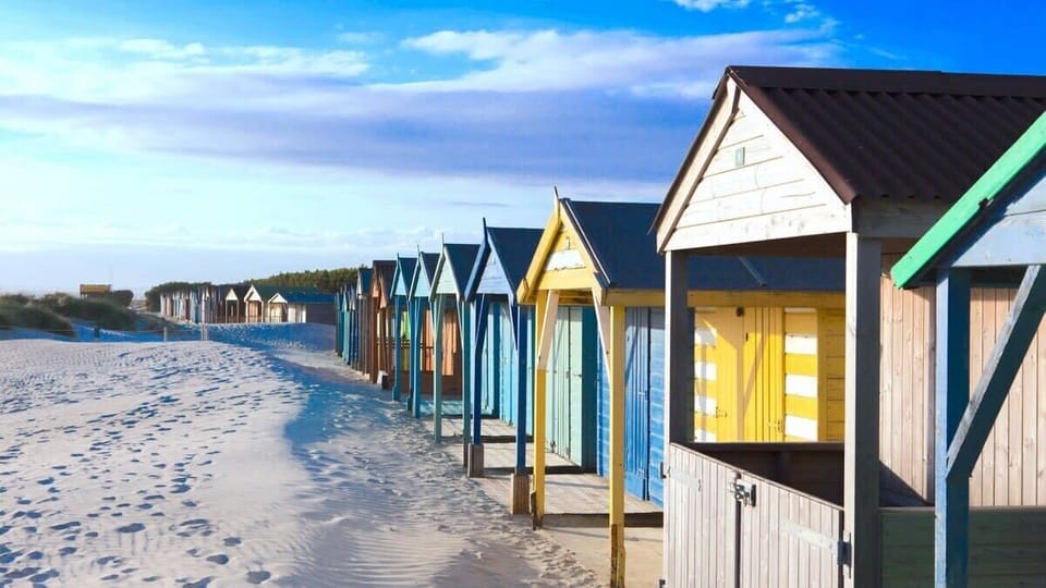 Beautiful beach huts , at West Wittering's sandy beach.