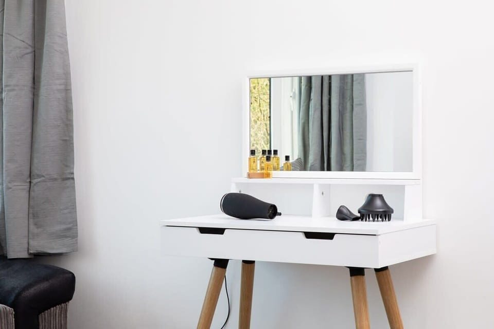 A contemporary dressing table to help guests get ready to go out.