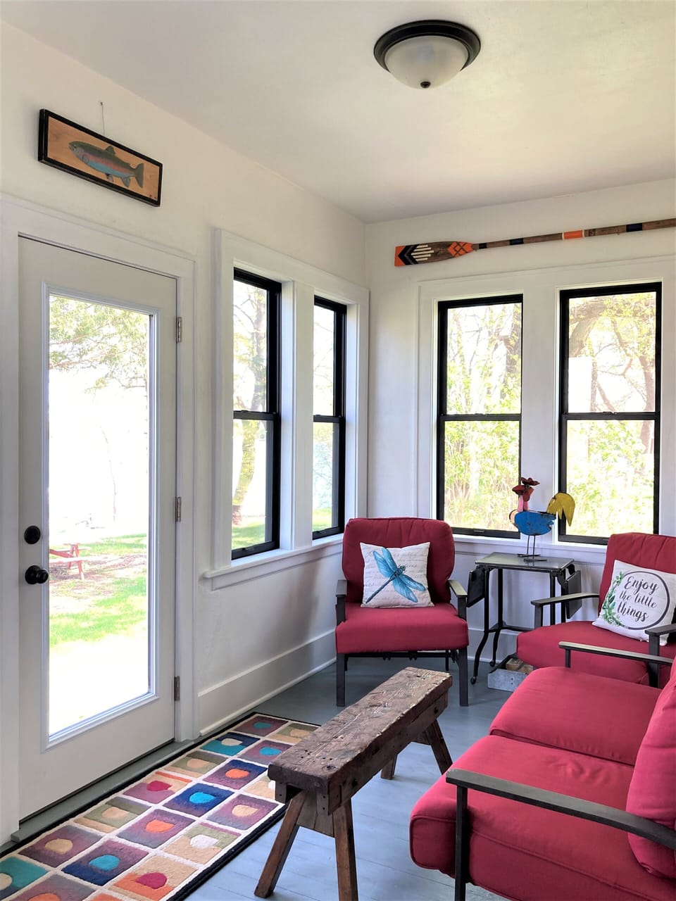 Enjoy morning coffee on the front porch surrounded by all new windows.  