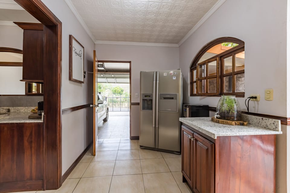 Large fridge, walk out to garage with room for 2 cars.