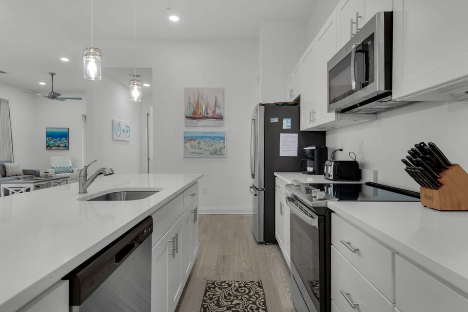 Fully equipped modern kitchen with stainless appliances