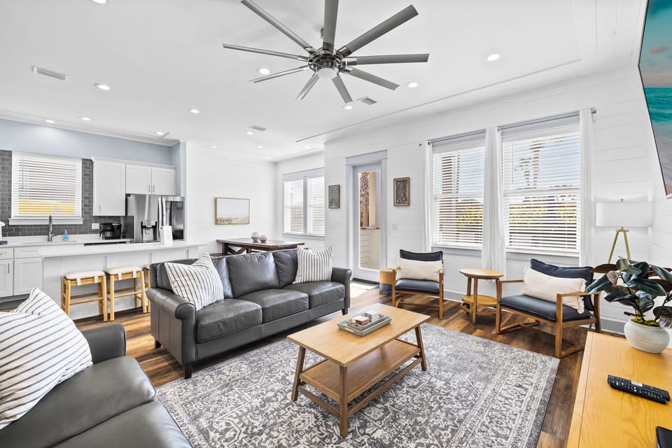 The living room opens up to the backyard.