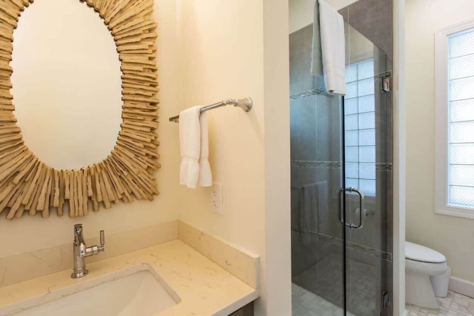 Private Bathroom with Single Vanity and Walk-in Shower