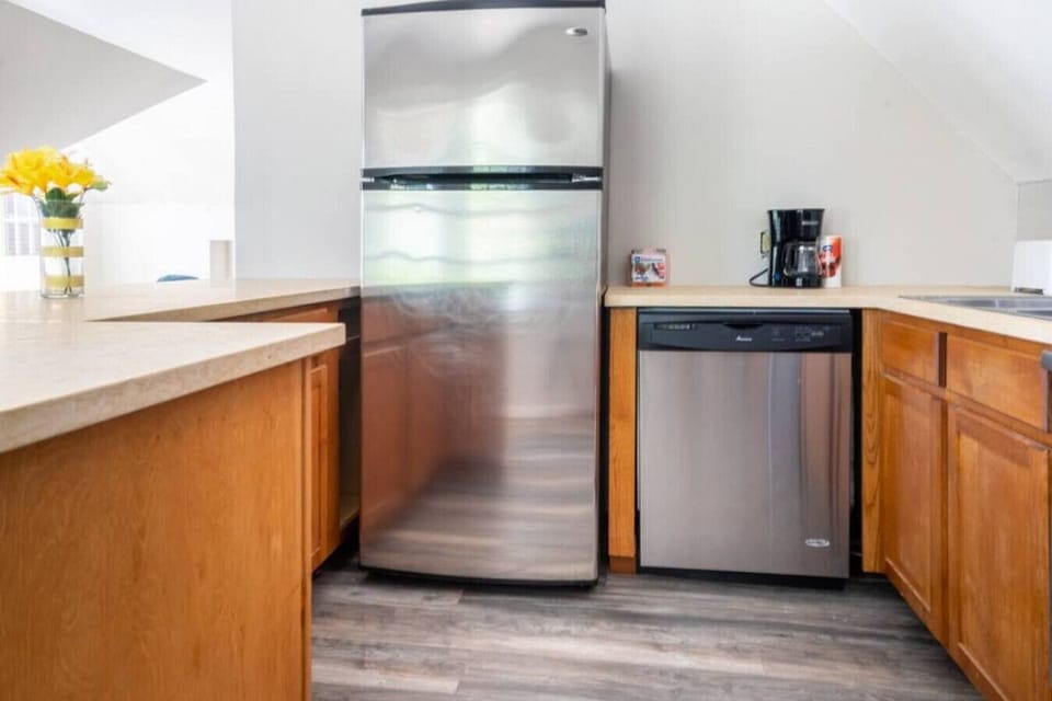 Full-size fridge for cold drinks and takeout, plus a coffee maker with complimentary coffee to start your day.