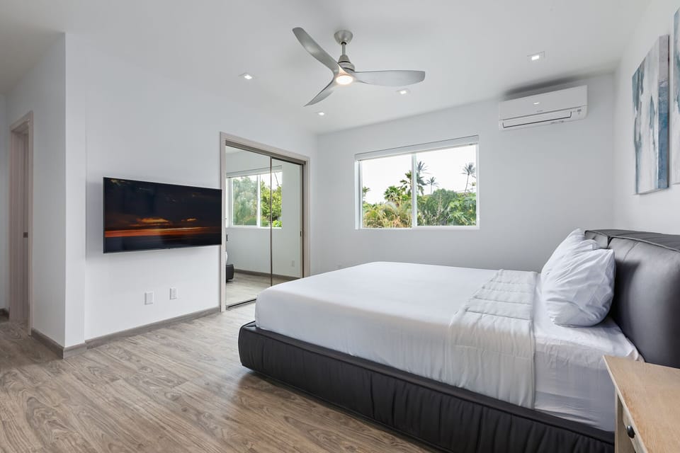 2nd Master Bedroom: King size bed with attached bath and smart TV. 