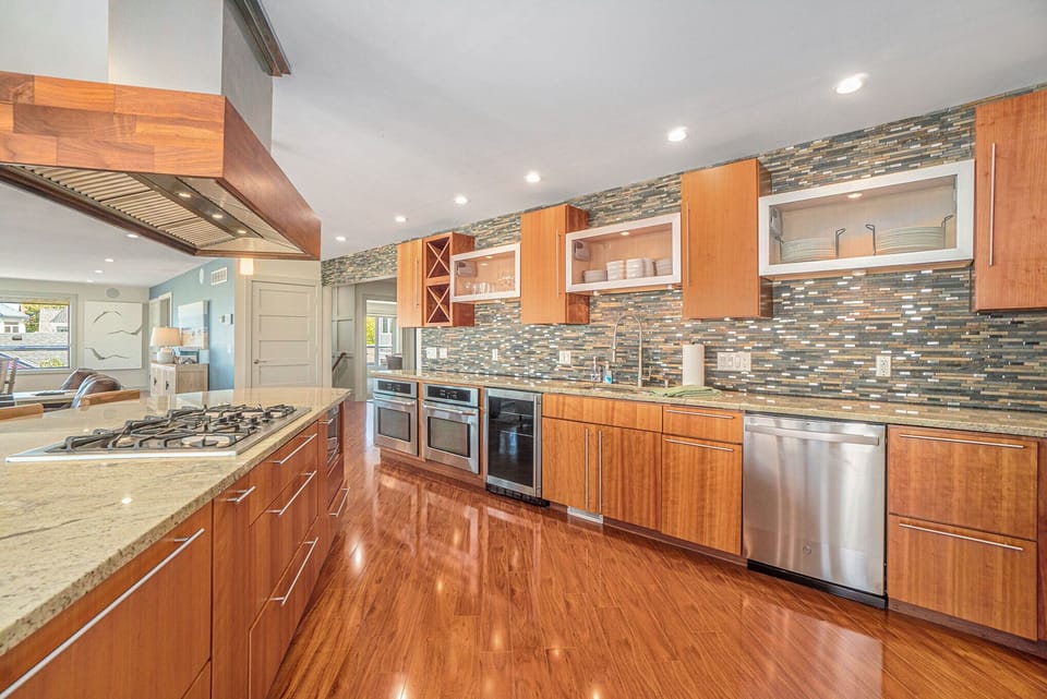 Double ovens, wine fridge and 6 burner stove are just a few of the amenities 