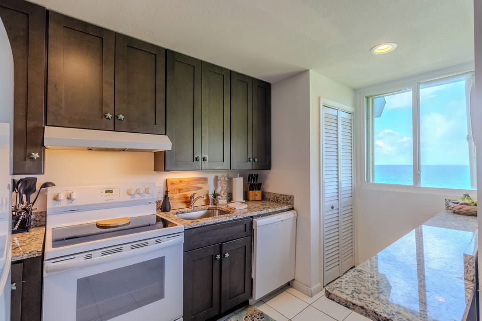 Fully stocked kitchen with ocean-facing window