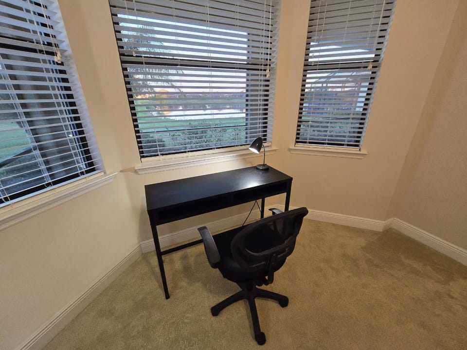 MASTER BEDROOM HAS AN OFFICE DESK/WORK SPACE