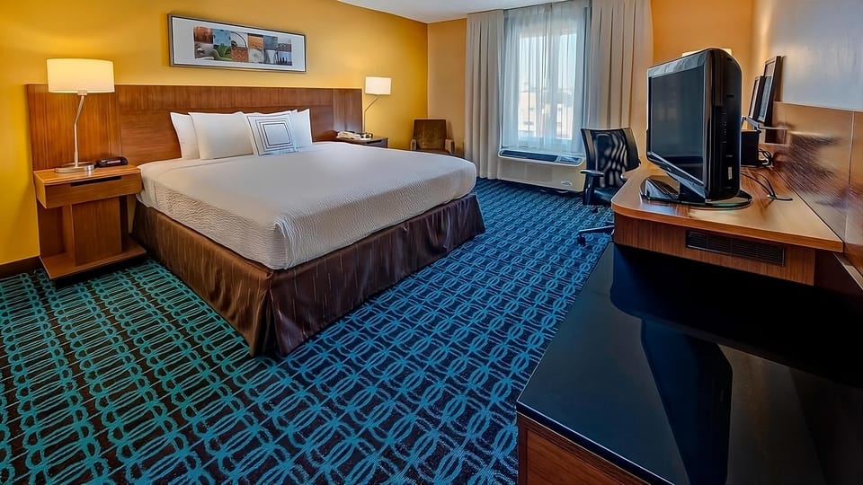 Sink into a restful king bed after a full day.