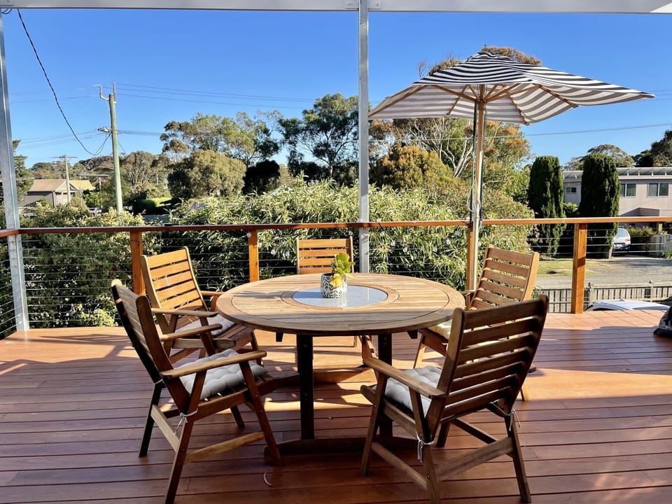 Outdoor table on large sunny deck