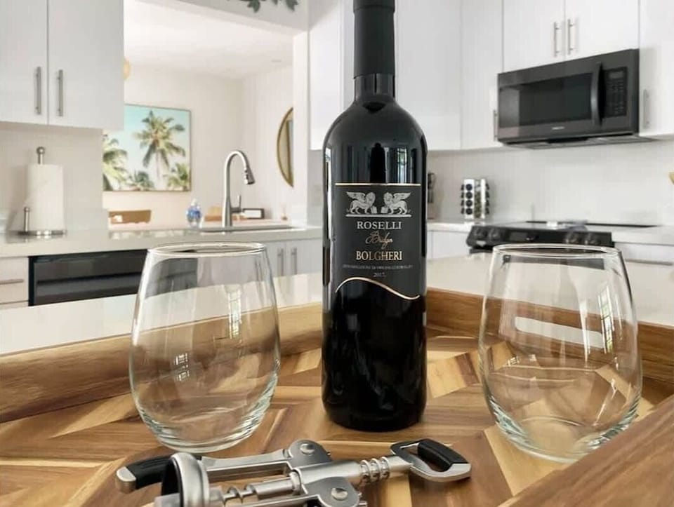 Take a sip of complimentary wine in the property.