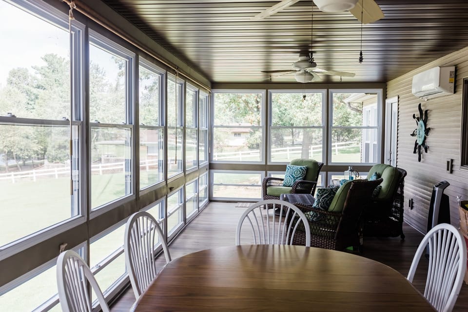 Sunroom with a lake view 