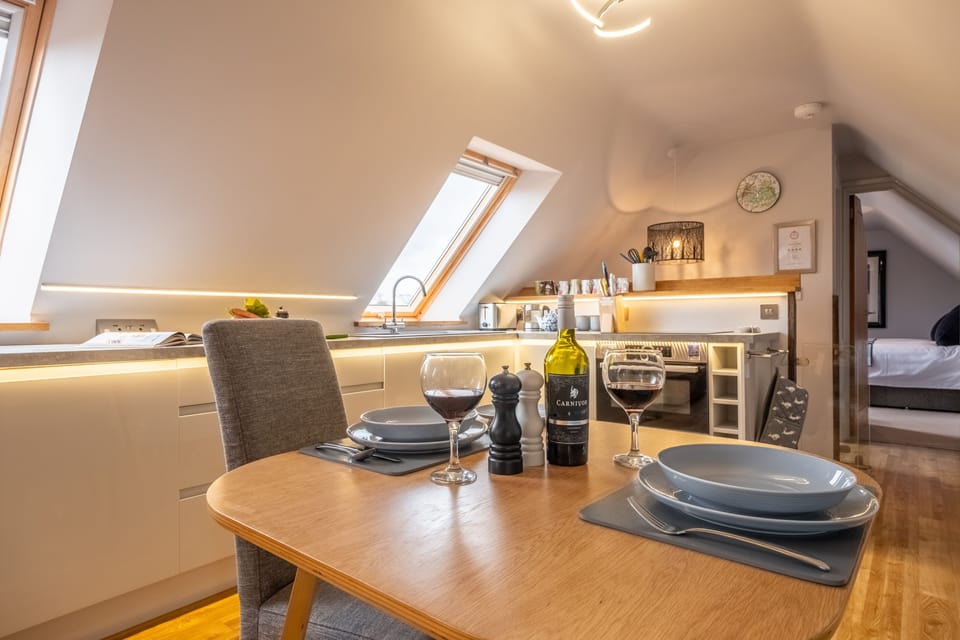 First floor: Dining area and kitchen