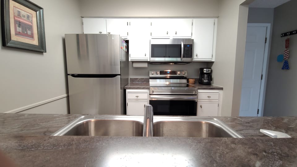 Kitchen from view of Breakfast Bar