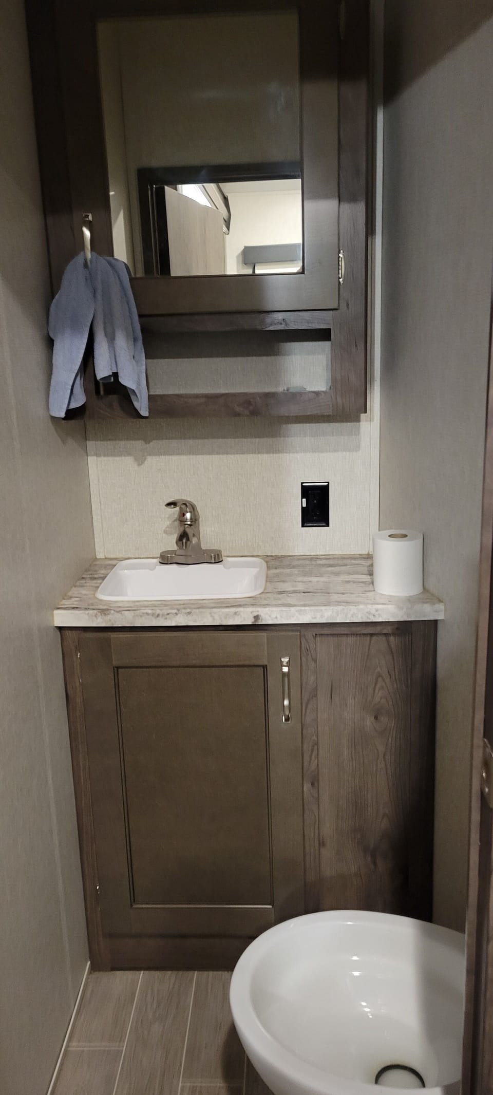 Half bath off of back bedroom.