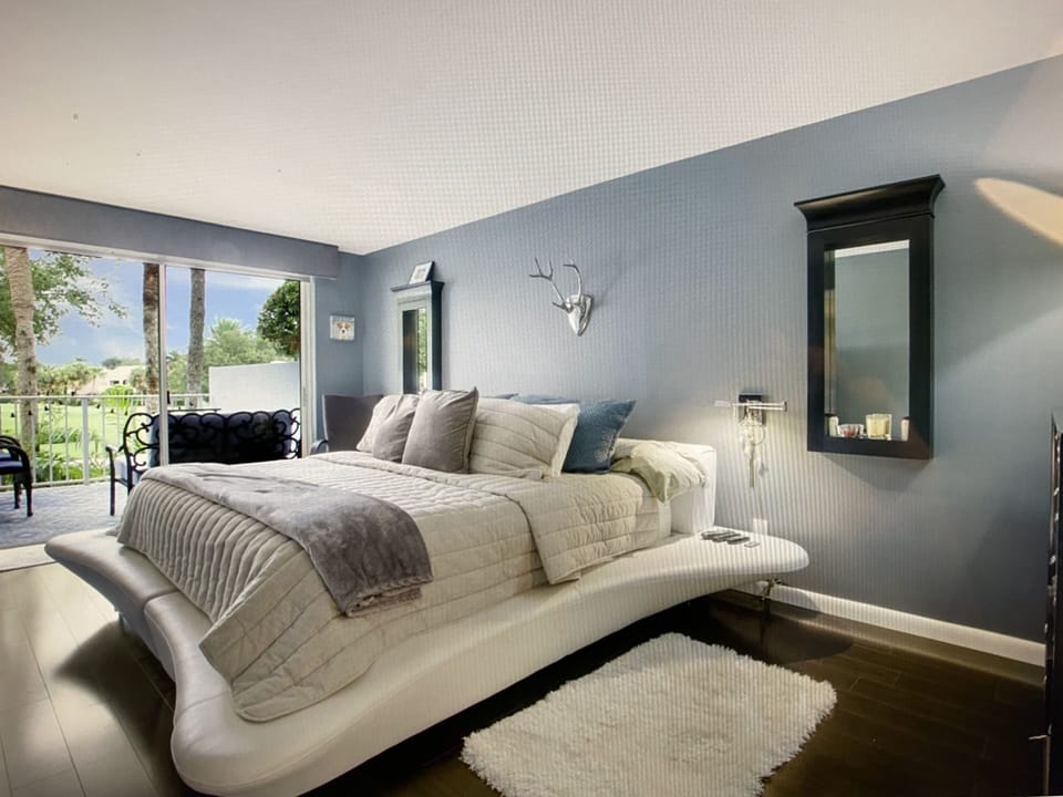 Luxury leather wrapped king bedding hotel style suite. Private terrace