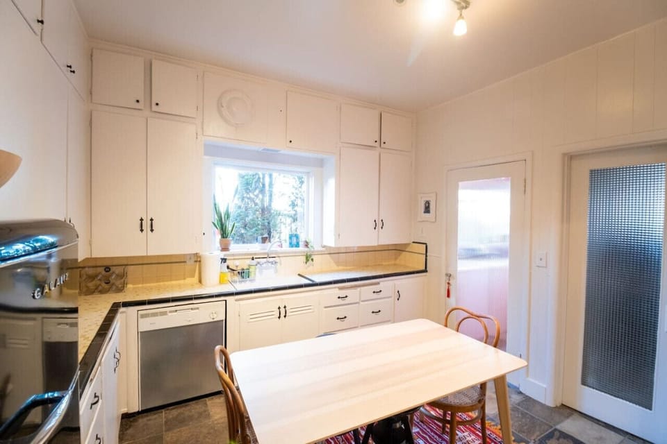Kitchen table comfortably seats 4 and makes the entire room feel connected.